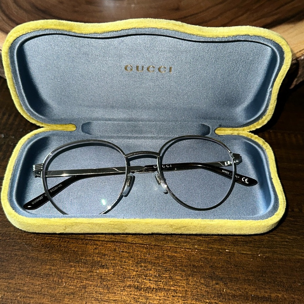 Unisex round Gucci eyeglasses